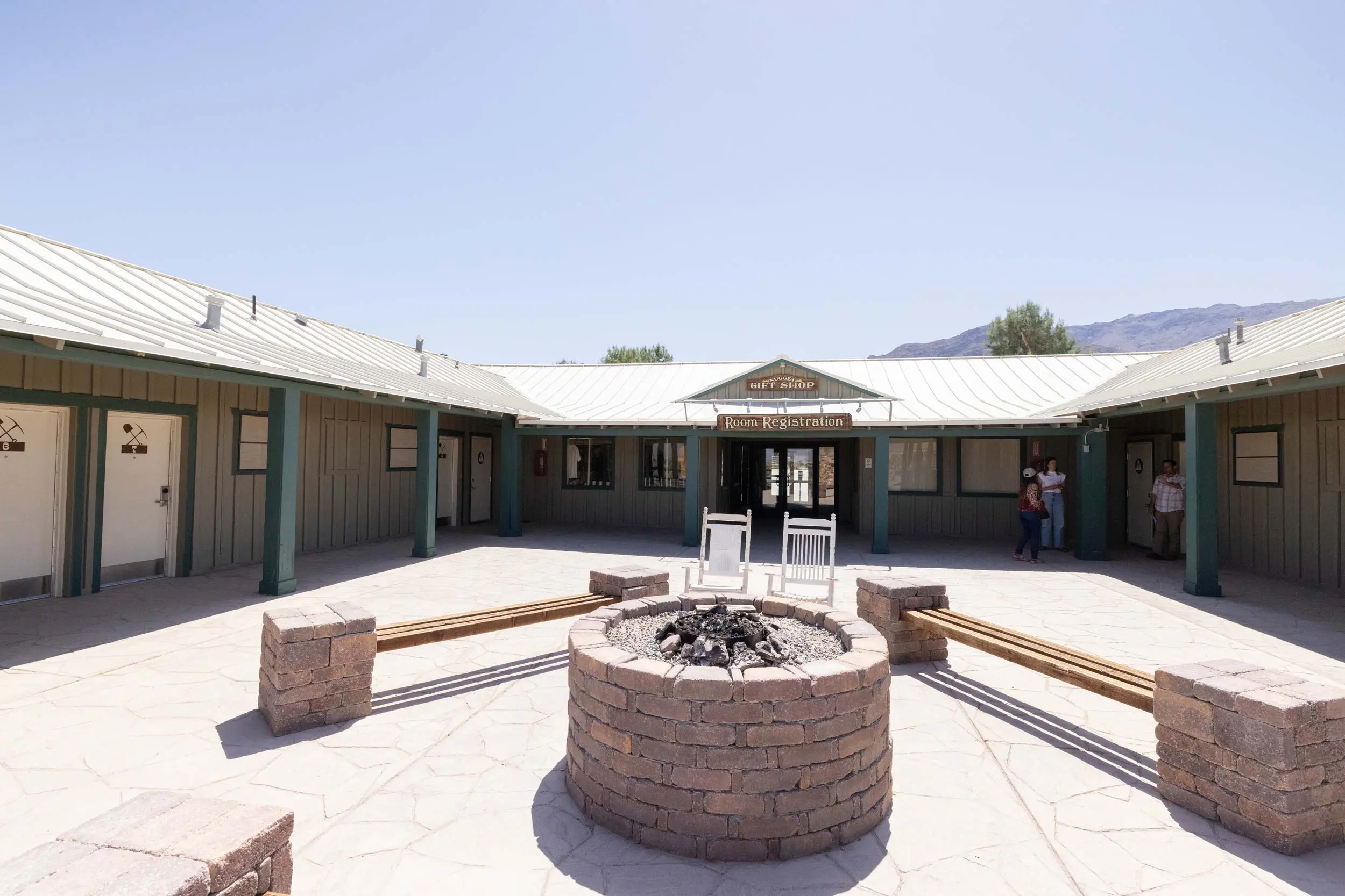 patio with firepit in front of the registrations office